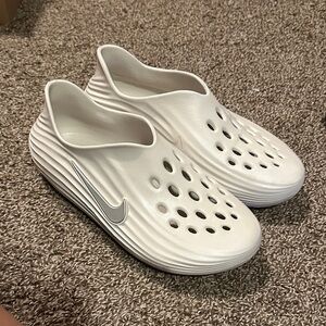 Nike White Perforated Slip-On Shoes
